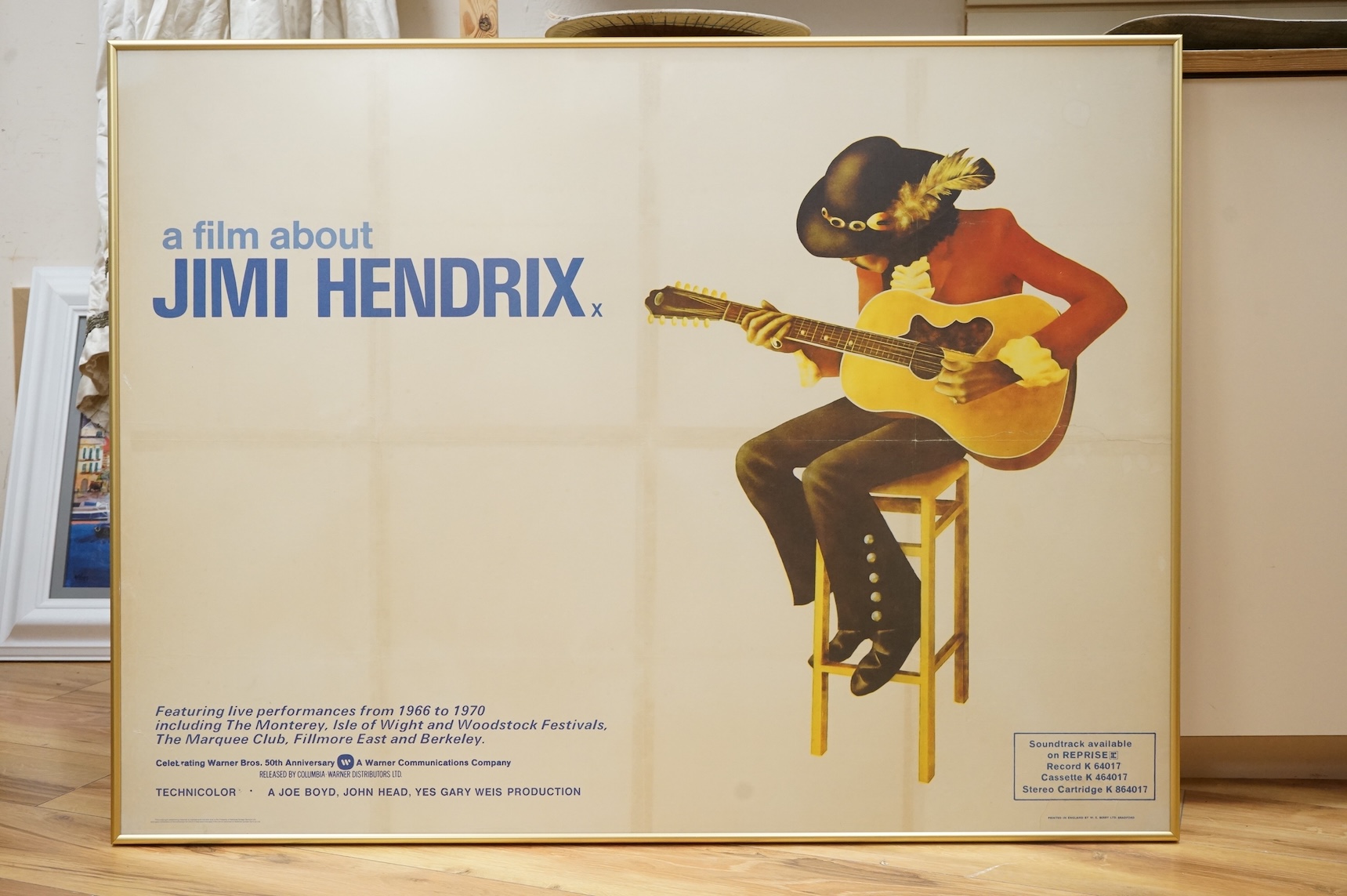 Jimi Hendrix interest; a framed 1973 quad advertising film poster ‘a film about Jimi Hendrix’, printed in England by W.E.Berry Ltd. Bradford, provenance; collected at the time of the film’s screening by the vendor from a